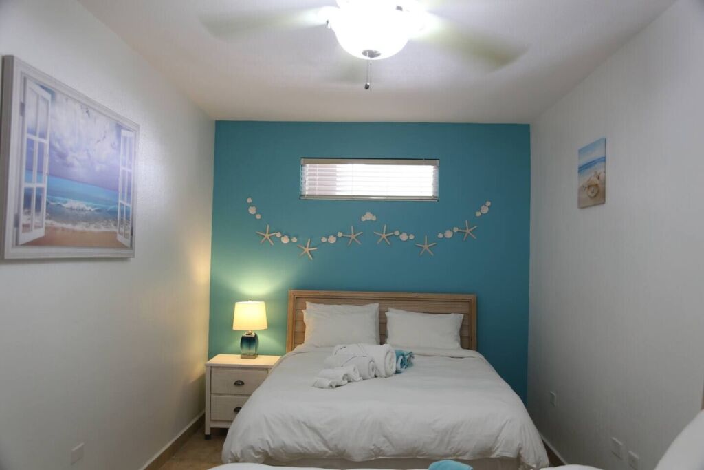 Bedroom 2 - 1 Queen Bed & 2 Single beds