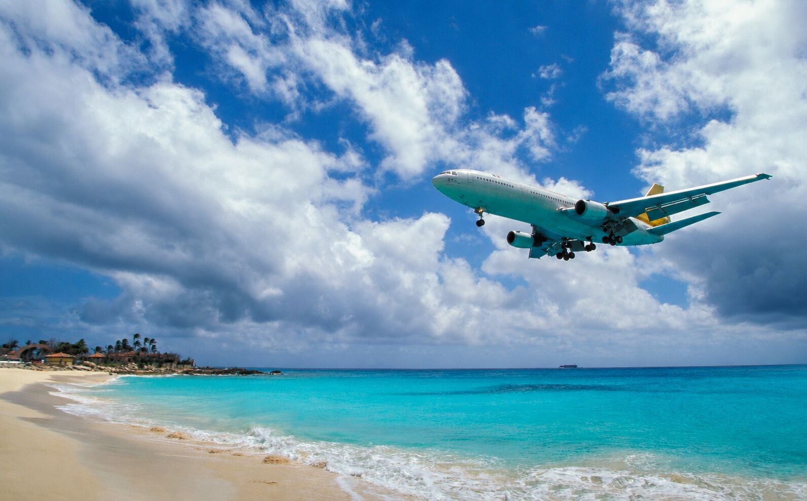 Maho Beach in St Maarten with planes landing overhead