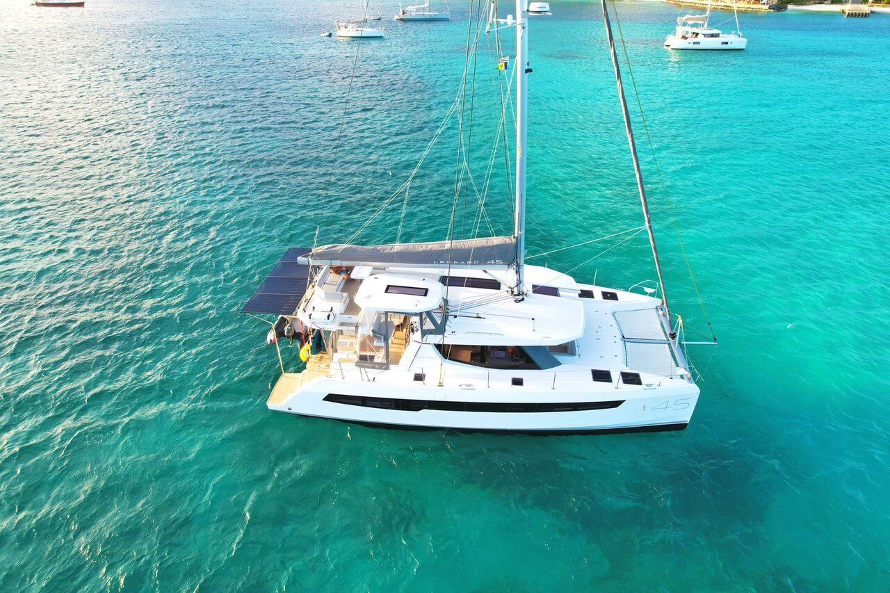 Bareboat catamaran sailing in turquoise water in St Martin